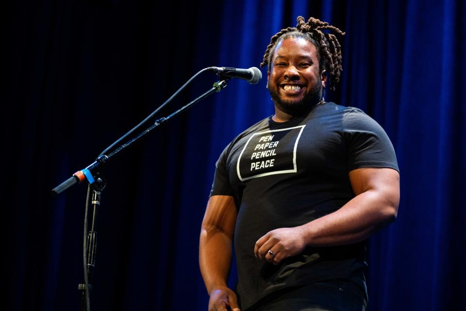 Jordan Brooks tells a story of community during the Des Moines Register Storytellers Project Tuesday, Feb. 27, 2024, at Hoyt Sherman Place in Des Moines.