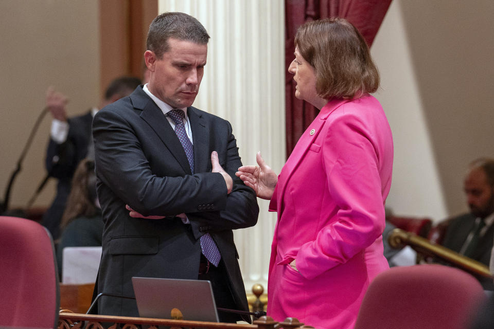 State Senate President Pro Tempore Designate Mike McGuire, left, of Healdsburg, meets with current Pro Tempore Toni Atkins in the state Senate Chambers in Sacramento, Calif., Thursday, Jan. 25, 2024. McGuire will replace Atkins when he is sworn-in Monday Feb. 5, 2024. (AP Photo/Rich Pedroncelli)