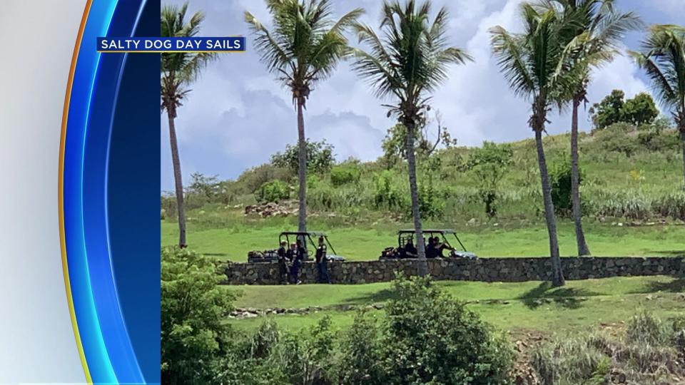 FBI agents and police on golf carts heading to Jeffrey Epstein's estate in U.S. Virgin Islands on August 12, 2019.  / Credit: Courtesy: Salty Dog Day Sails