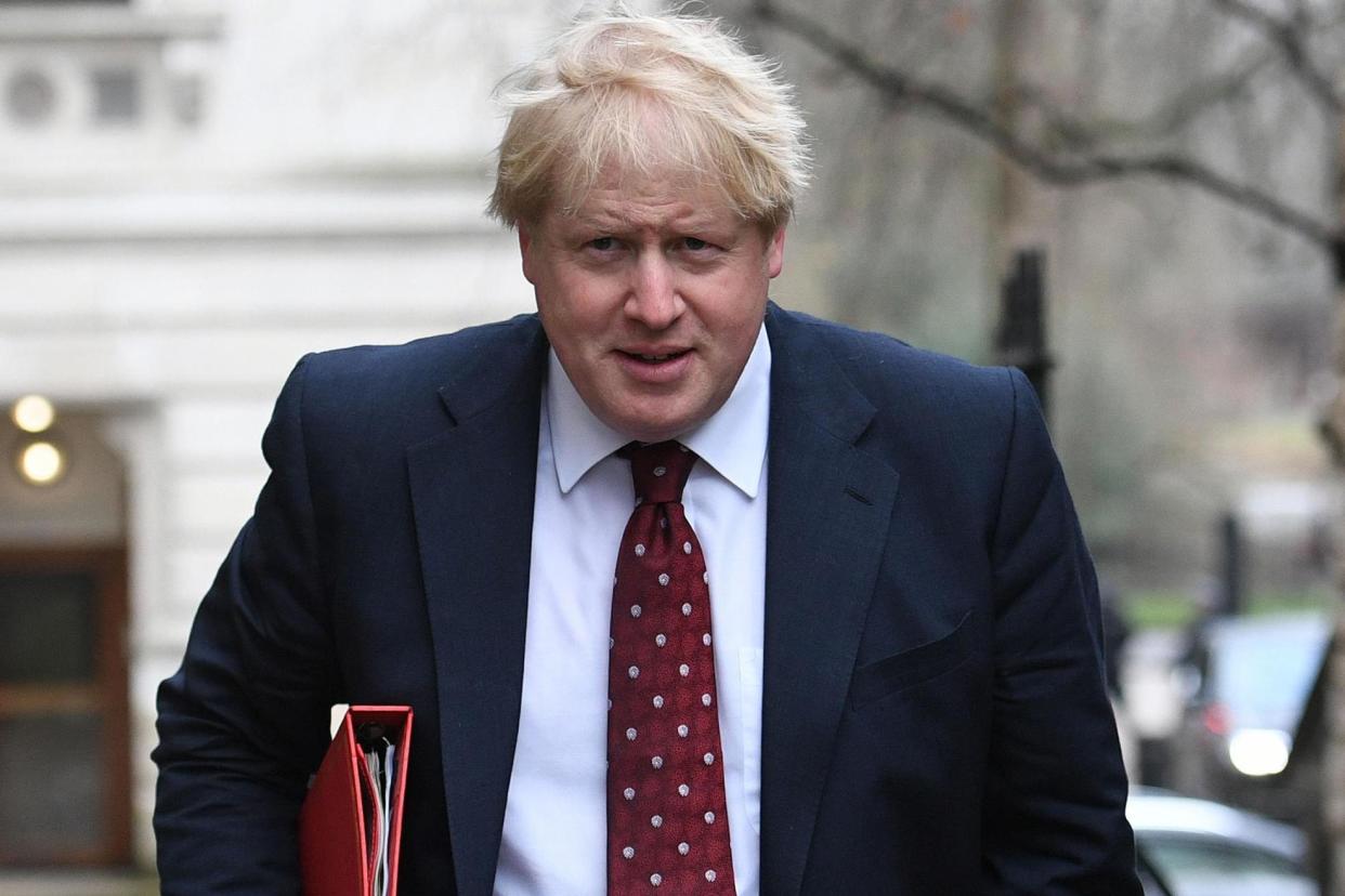Boris Johnson: The Foreign Secretary turned up to an empowering women event with a group of men: PA