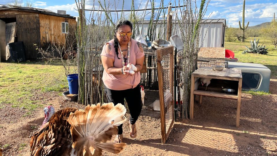 Faith Ramon handles eggs at her home near Nogales, Arizona. - CNN