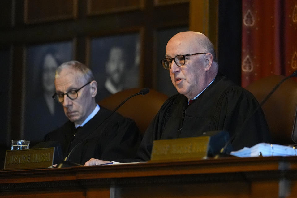 Justice Mark S. Massa questions an attorney during oral arguments before the Indiana Supreme Court at the Statehouse in Indianapolis, Monday, Feb. 12, 2024. GOP Senate candidate, John Rust, who is suing to appear on the primary ballot. A trial judge ruled in December that a state law that stipulates candidates must vote in two primary elections with their party is unconstitutional. The state appealed the ruling. (AP Photo/Michael Conroy, Pool)