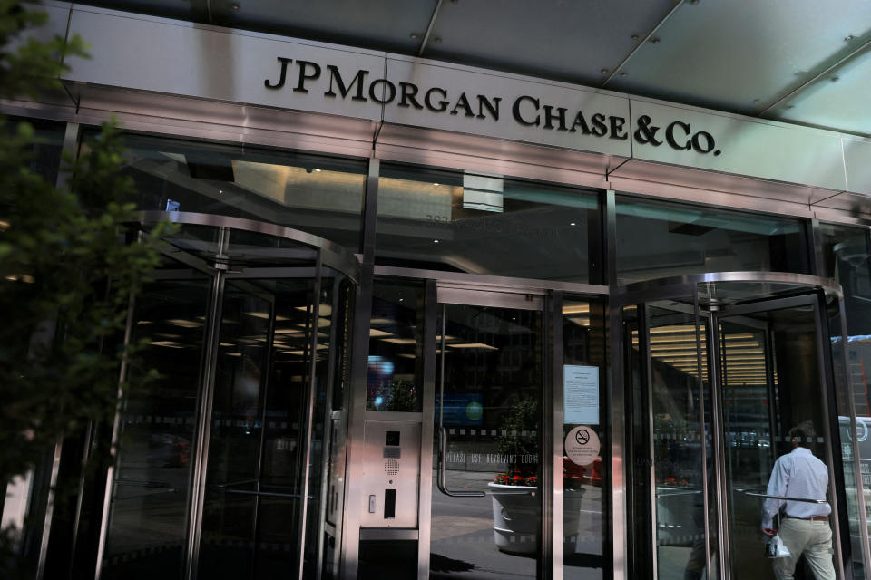 FILE PHOTO: A person enters the JPMorgan Chase & Co. New York Head Quarters in Manhattan, New York City, U.S., June 30, 2022. REUTERS/Andrew Kelly/File Photo