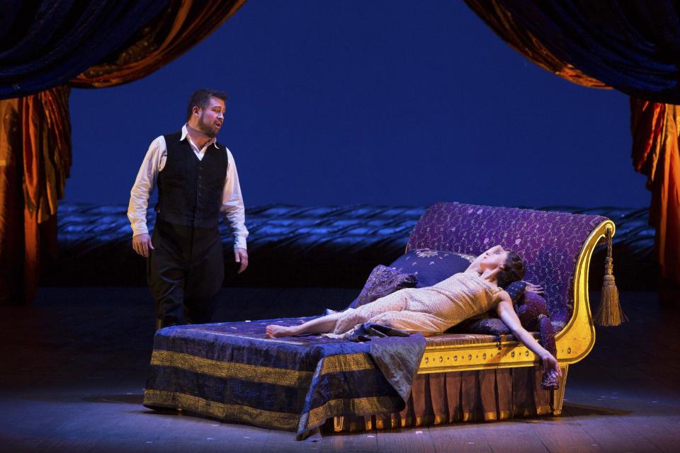 In this March 27, 2013 photo provided by the Metropolitan Opera, Natalie Dessay as Cleopatra, right, and David Daniels as Julius Caesar perform during a rehearsal of Handel's "Giulio Cesare." (AP Photo/ Metropolitan Opera, Marty Sohl)