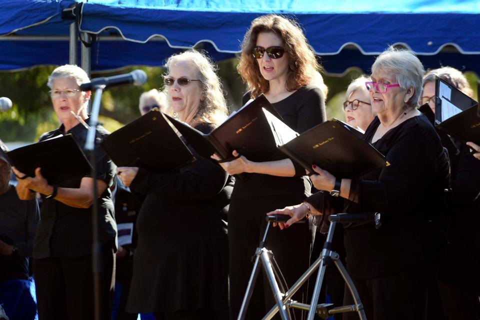 Choir members from the Fort Walton Beach United Methodist Church sing during the annual Lazarus Field Service on Wednesday at the Beal Memorial Cemetery. The service honors those people who have died in Okaloosa County without the means or family members to provide for a funeral service and burial.