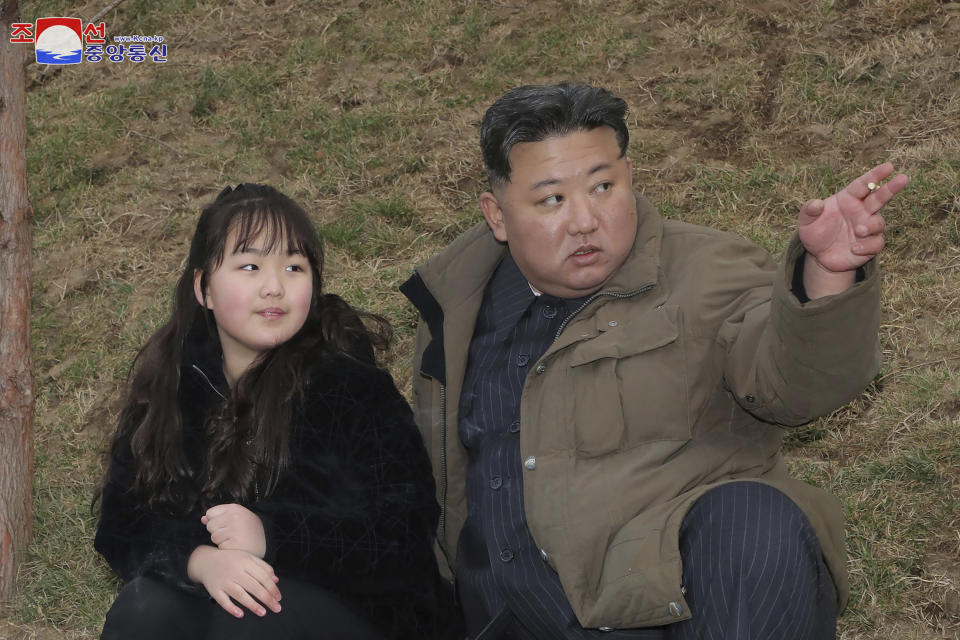 This photo provided April 14, 2023, by the North Korean government, shows North Korean leader Kim Jong Un, right, and his daughter, as they inspect what it says is the test-launch of Hwasong-18 intercontinental ballistic missile Thursday, April 13, 2023 at an undisclosed location, North Korea. Independent journalists were not given access to cover the event depicted in this image distributed by the North Korean government. The content of this image is as provided and cannot be independently verified. Korean language watermark on image as provided by source reads: "KCNA" which is the abbreviation for Korean Central News Agency. (Korean Central News Agency/Korea News Service via AP)