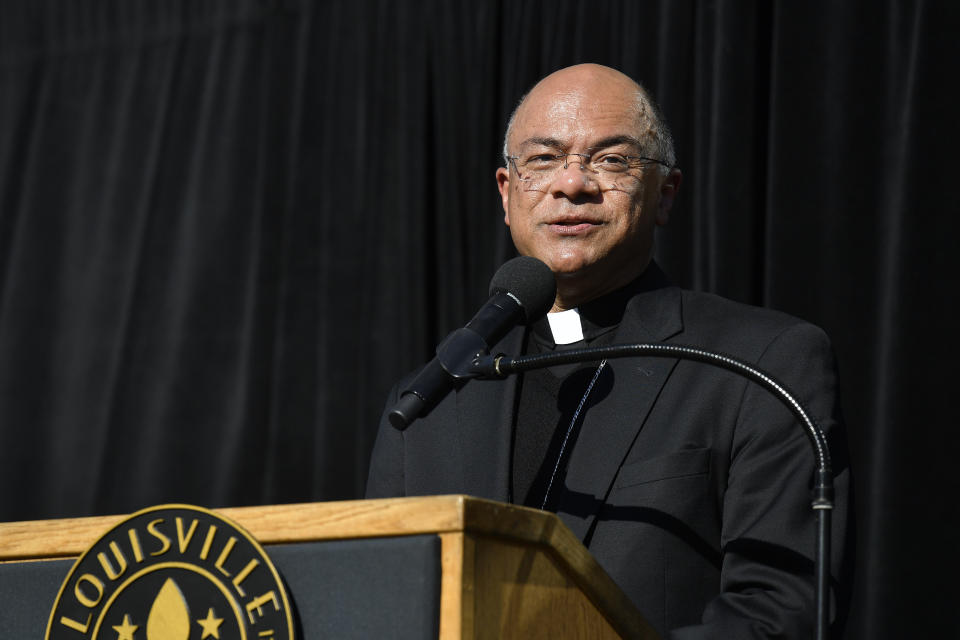 Louisville Archbishop Shelton Fabre speaks during a vigil for the victims of Monday's shooting in Louisville, Ky., Wednesday, April 12, 2023. (AP Photo/Timothy D. Easley)