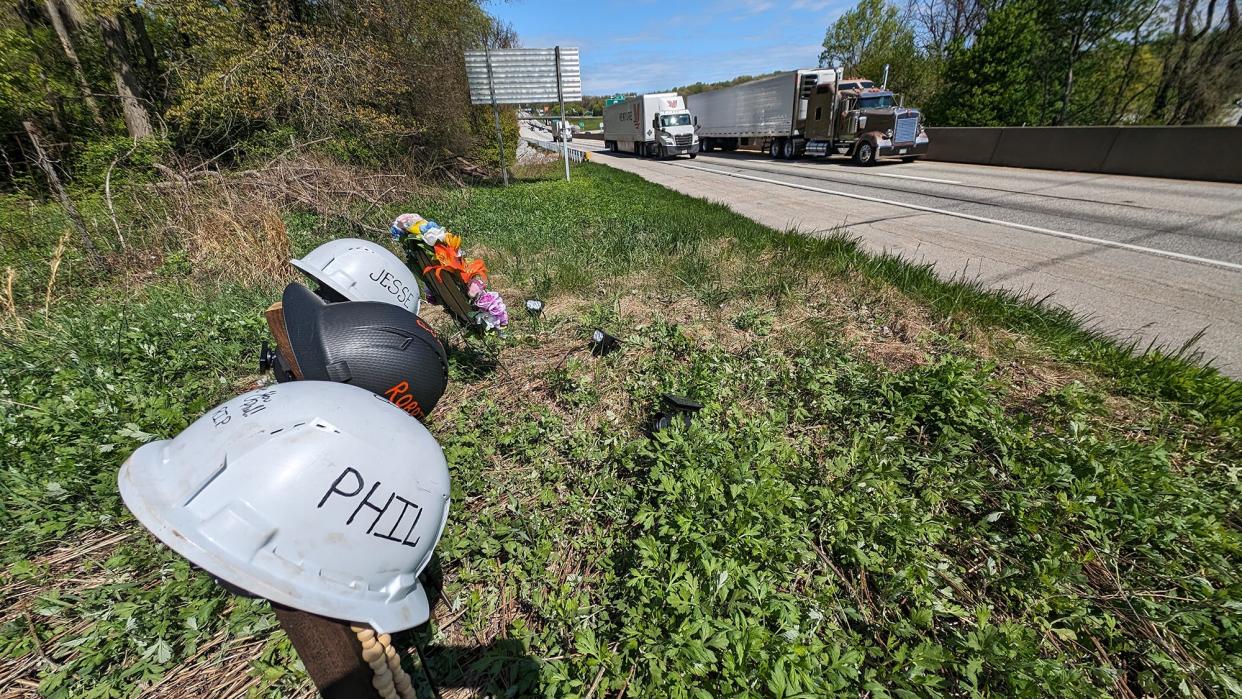 A memorial for Philson Hinebaugh III, 24, of Johnstown, Pa., Robert Hampe, 42, of Meyersdale, Pa., and Jesse McKenzie, 24, of Somerset, Pa. Next to the southbound lans of Interstate 83 around mile marker 35.5 on April 25. The construction workers died in the April 17 crash in Fairview Township.