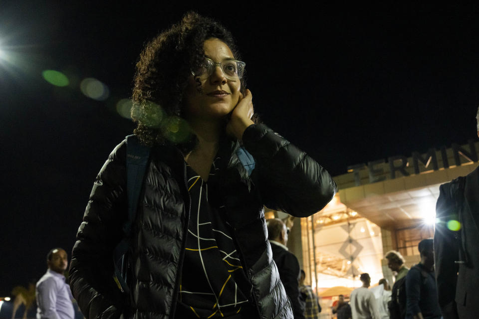 Sanaa Seif, sister of Egypt's jailed leading pro-democracy activist Alaa Abdel-Fattah, who is on a hunger and water strike, leaves the Sharm El Sheikh International Airport shortly after arriving, in Sharm el-Sheikh, Egypt, on Monday, Nov. 7, 2022. (AP Photo)