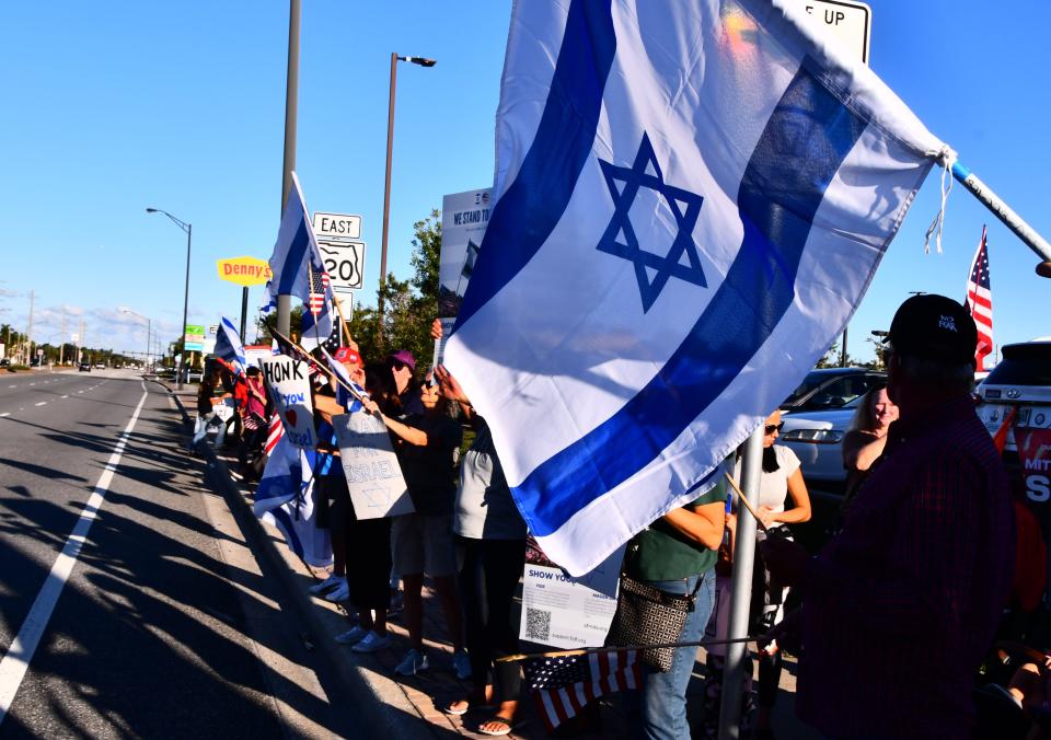 More than a hundred people showed up on the corner of 520 and Courtnay Parkway recently to show their support for Israel. There was a strong presence of support from the Brevard County Sheriff’s Office.
(Credit: MALCOLM DENEMARK/FLORIDA TODAY)