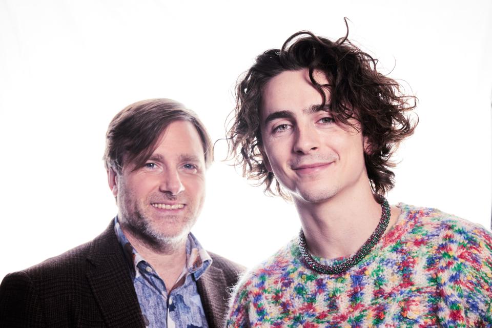 "Wonka" director Paul King, left, and Timothée Chalamet pose in London last month.