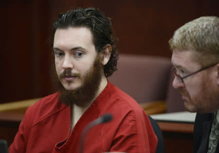 James Holmes and his defense attorney Daniel King (R) sit in court for an advisement hearing at the Arapahoe County Justice Center in Centennial, Colorado June 4, 2013. REUTERS/Andy Cross/Pool