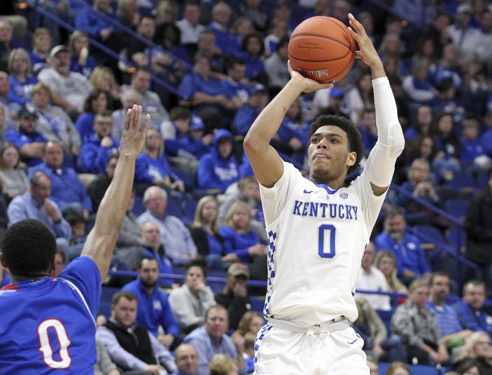 Kentucky's Quade Green, right, shoots while defended by Tennessee State's Armani Chaney during the second half of a 2018 game. (AP)