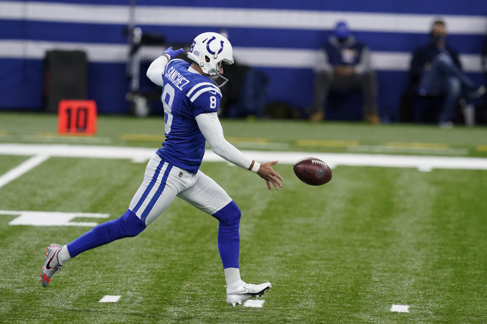 Indianapolis Colts punter Rigoberto Sanchez punts before an NFL football game against the Tennessee Titans, Sunday, Nov. 29, 2020, in Indianapolis. Sanchez says he will have surgery Tuesday to remove a cancerous tumor. Sanchez made the announcement in an Instagram post (AP Photo/Darron Cummings)