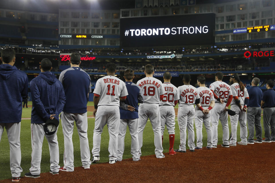 <p>The Boston Red Sox stand during a moments silence before a game against the Toronto Blue Jays at Rogers Center in Toronto, Ontario, Canada, April 24, 2018. (Photo: John E. Sokolowski-USA TODAY Sports/Reuters) </p>