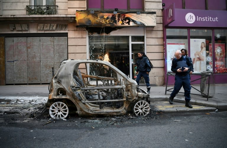 A car torched during the yellow vest anti-government protests in Paris on December 8