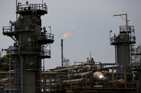 FILE PHOTO: A view of state-owned oil giant Pertamina's refinery unit IV in Cilacap, Central Java, Indonesia January 13, 2016.Picture taken January 13, 2016. REUTERS/Darren Whiteside