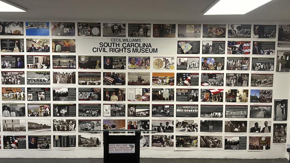 Dozens of photographs made by South Carolina civil rights photographer Cecil Williams are displayed at his museum, the only civil rights museum in the state, on Tuesday, Dec. 12, 2023, in Orangeburg, South Carolina. (AP Photo/Jeffrey Collins)