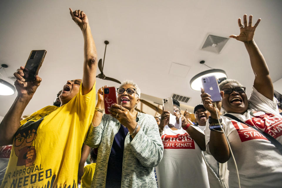 Supporters of Sen. Louise Lucas celebrate her win for Virginia's 18th District State Senate Democratic nomination at Bide-A-Wee golf course in Portsmouth, Va., on Tuesday, June 20, 2023. (Kendall Warner/The Virginian-Pilot via AP)