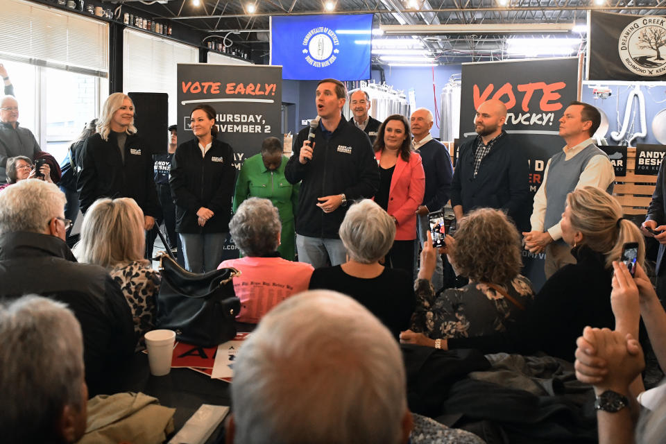 Kentucky Governor and Democratic candidate for re-election Andy Beshear speaks to supporters during a stop of his statewide bus tour in Richmond, Ky., Monday, Oct. 30, 2023. (AP Photo/Timothy D. Easley)