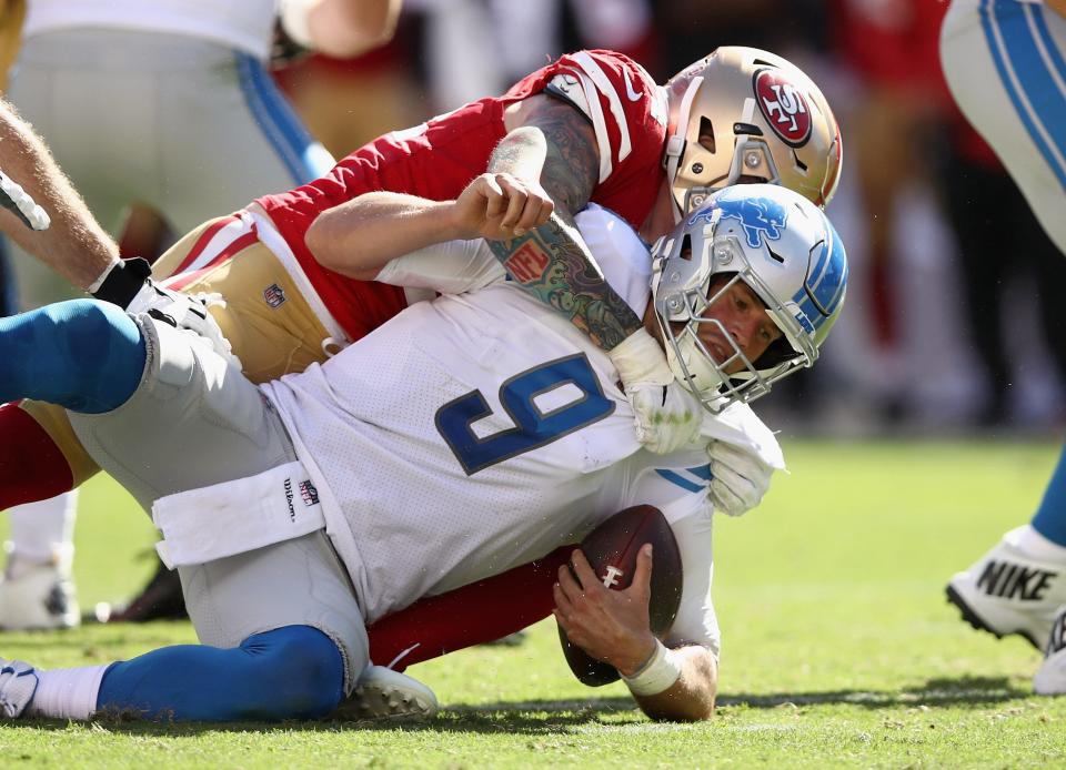 Detroit Lions' Matthew Stafford is sacked by Cassius Marsh of the San Francisco 49ers on Sept. 16, 2018 in Santa Clara, Calif.