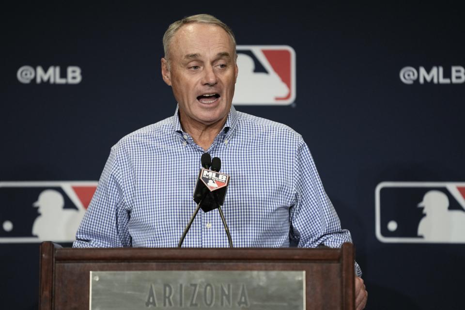 Major League Baseball Commissioner Robert Dean Manfred Jr. answers questions at spring training media day Wednesday, Feb. 15, 2023, in Phoenix. (AP Photo/Morry Gash)
