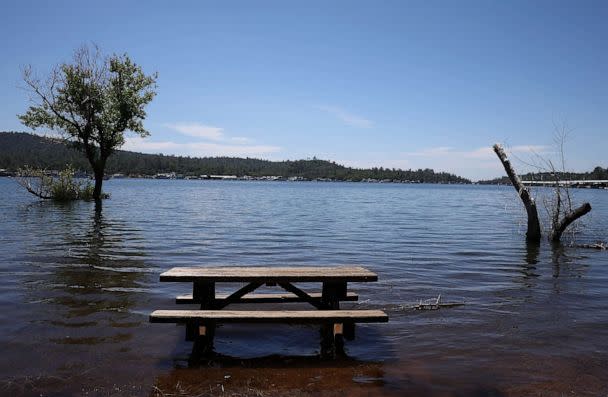 PHOTO: A picnic table sits partially submerged in the waters of Lake Oroville, June 15, 2023 in Oroville, Calif. (Justin Sullivan/Getty Images)