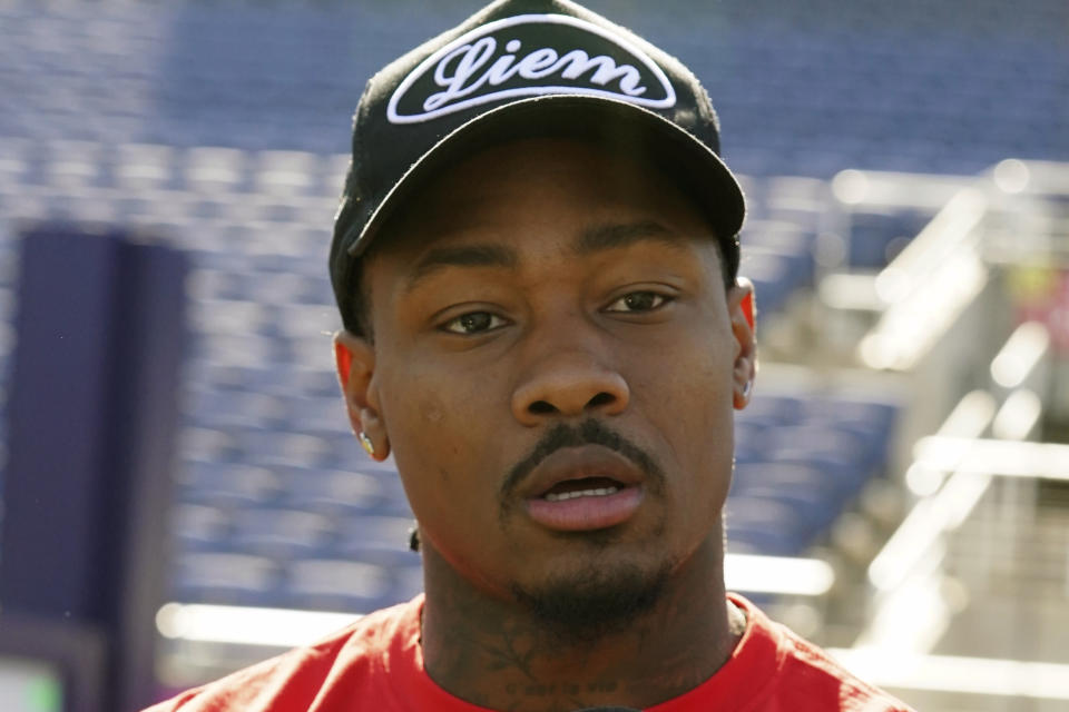 FILE - AFC wide receiver, Buffalo Bills' Stefon Diggs (14) speaks before Pro Bowl practice at Camping World Stadium on Friday, Feb. 2, 2024 in Orlando, Fla. The Buffalo Bills are trading their top receiving threat, Stefon Diggs, to the Houston Texans in a deal that was agreed to on Wednesday, April 3, 2024, a person with knowledge of the discussions confirmed to The Associated Press. (AP Photo/Vera Nieuwenhuis, File)