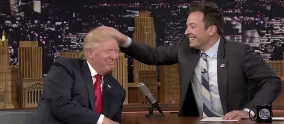 Jimmy running his hand through Donald Trump's hair