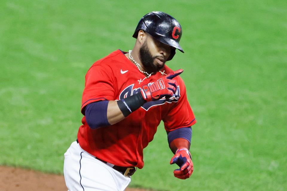 Cleveland's Carlos Santana rounds the bases after hitting a two-run home run off the Chicago White Sox, Monday, Sept. 21, 2020, in Cleveland.