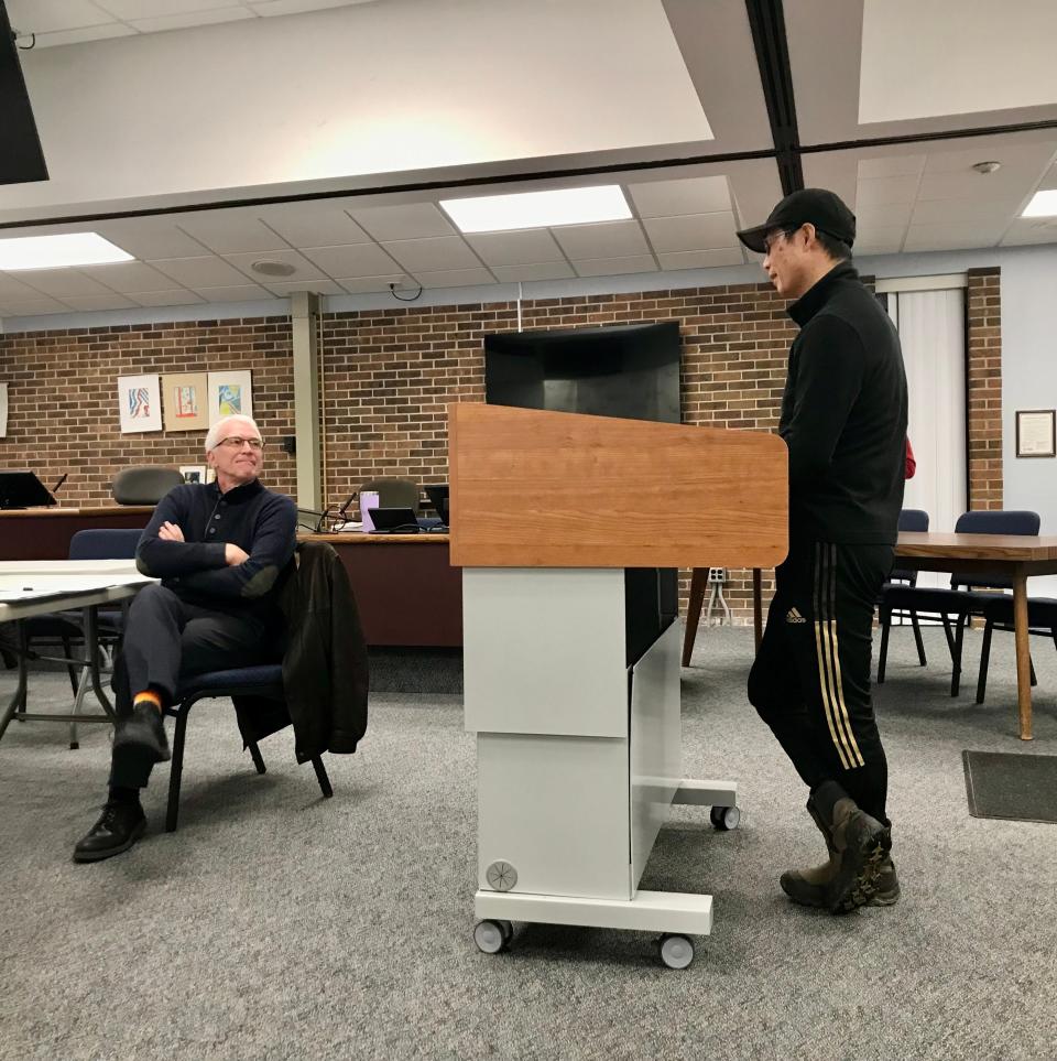 Meridian Economic Development Corp. member David Ledebuhr listens as former Greater Lansing Chinese Association President Yi Shi speaks to township officials Jan. 5, 2023.