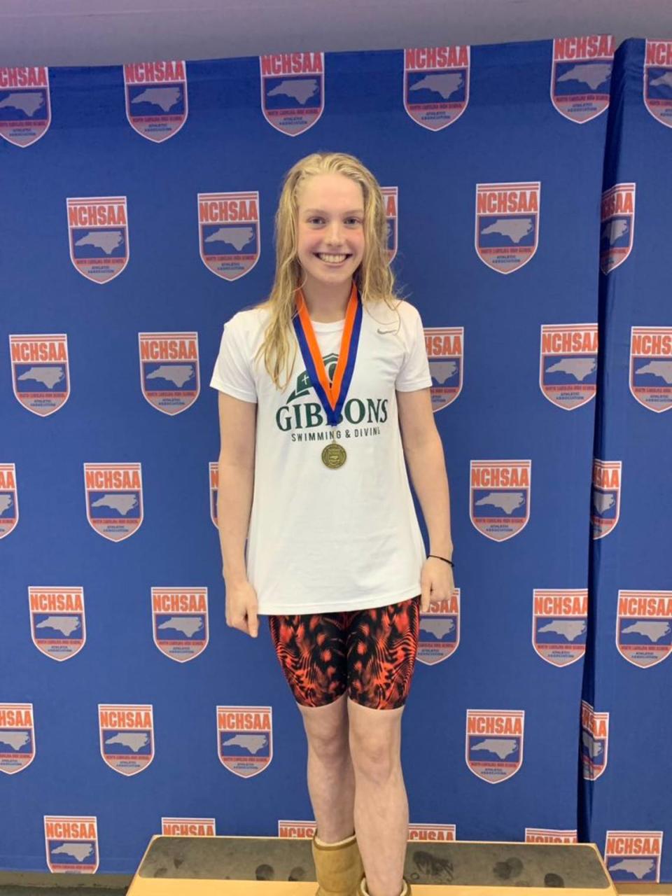 Claire Curzan, pictured in 2019 at age 14, has won multiple individual events at the N.C. High School Athletic Association state championships while competing for Raleigh’s Cardinal Gibbons. At 16, she will be one of the youngest Olympians competing for the USA in Tokyo in July.