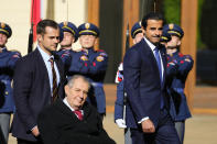 Czech Republic's President Millos Zeman, left, welcomes Qatari Emir Sheikh Tamim Bin Hamad Al-Thani at the Prague Castle in Prague, Czech Republic, Wednesday, Oct. 5, 2022. (AP Photo/Petr David Josek)