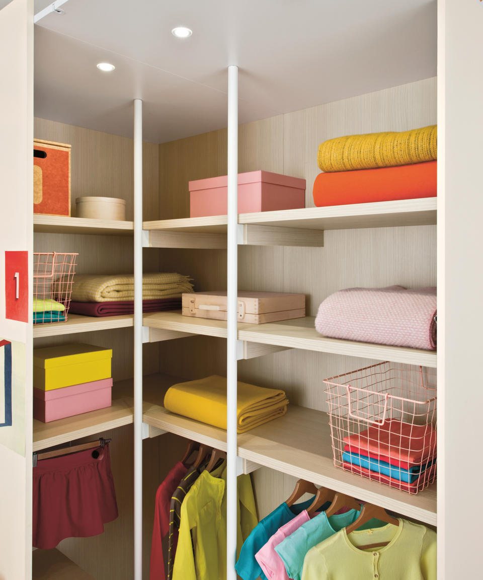 7. Use rails and shelves as a simple, streamlined walk-in closet