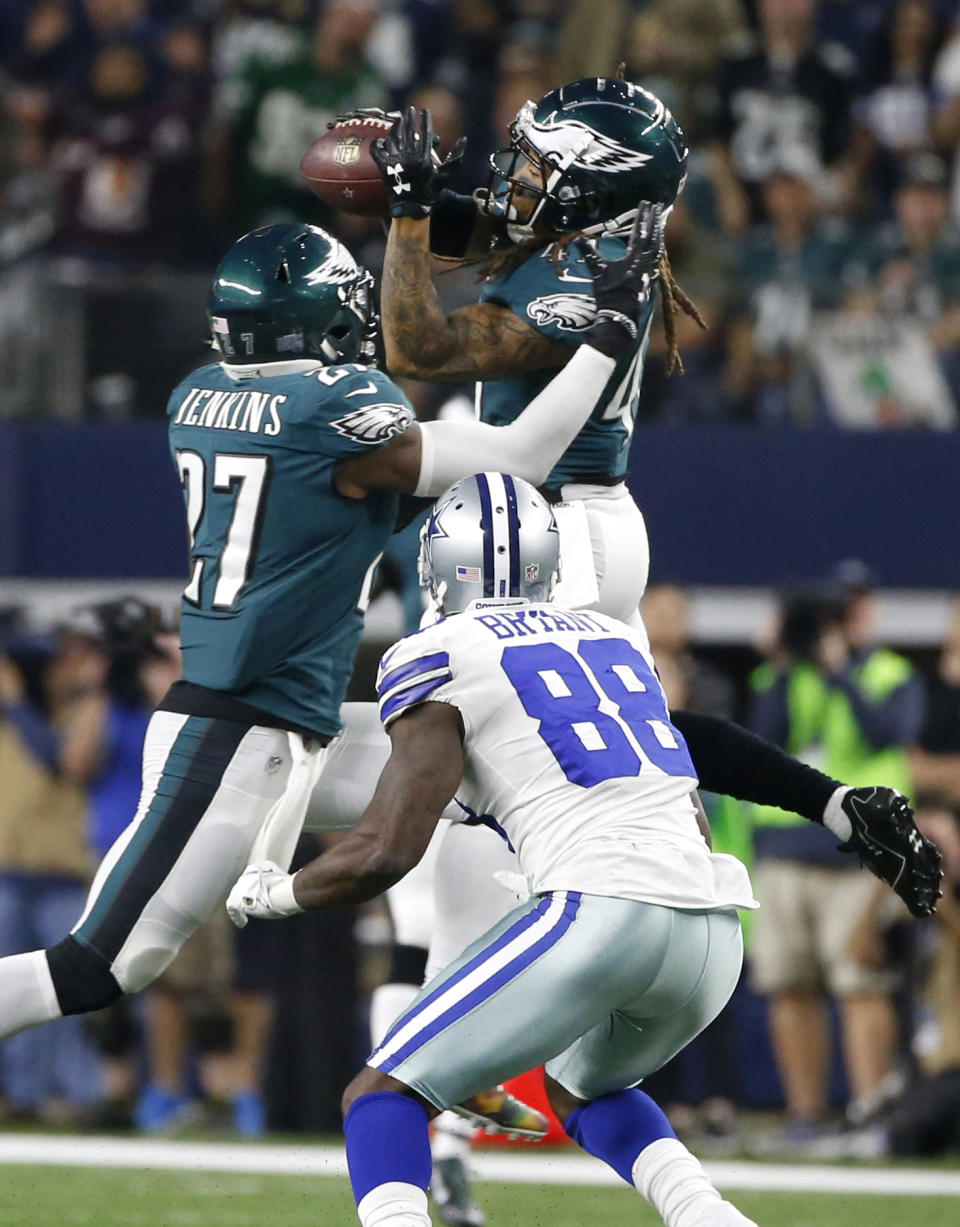 <p>Philadelphia Eagles safety Malcolm Jenkins (27) and Dallas Cowboys wide receiver Dez Bryant (88) watch as the Eagles’ Ronald Darby, top, intercepts a pass intended for Bryant in the first half of an NFL football game, Sunday, Nov. 19, 2017, in Arlington, Texas. (AP Photo/Ron Jenkins) </p>