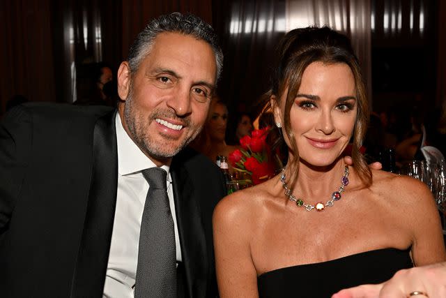 <p>Lester Cohen/Getty</p> (L) Mauricio Umansky and Kyle Richards