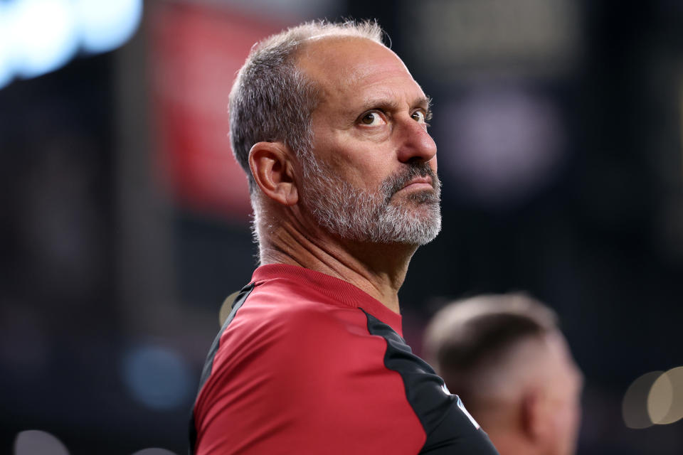 PHOENIX, ARIZONA – JULY 28: Manager Torey Lovullo #17 of the Arizona Diamondbacks looks on during the national anthem before the game against the Arizona Diamondbacks at Chase Field on July 28, 2024 in Phoenix, Arizona. The Pirates defeated the Diamondbacks 6-5 in 10 innings. (Photo by Chris Coduto/Getty Images)