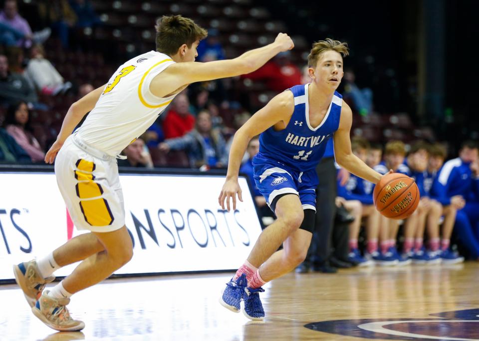 Hartville's Logan Simpson drives downcourt as the Eagles take on the Camdenton Lakers in the Blue Division of the Blue & Gold Tournament at Great Southern Bank Arena on Tuesday, Dec. 27, 2022.