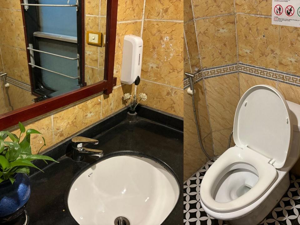 Sink and toilet in train bathroom.