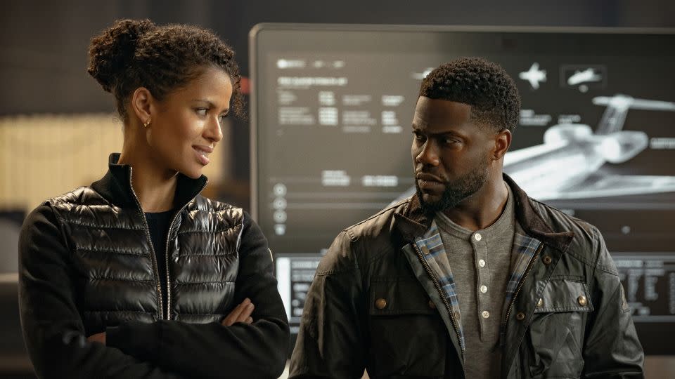 Gugu Mbatha-Raw and Kevin Hart in the Netflix movie "Lift." - Christopher Barr/Netflix