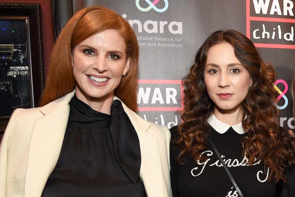 <p>Michael Kovac/Getty</p> Sarah Rafferty and Troian Bellisario attend the Good For A Laugh Comedy Benefit in support of children affected by war in Los Angeles on March 1, 2019