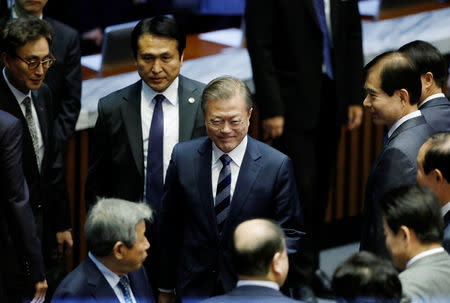 South Korean President Moon Jae-in leaves after delivering his speech on the government's 2019 budget proposal during a plenary session at the National Assembly in Seoul, South Korea, November 1, 2018. REUTERS/Kim Hong-Ji/Pool