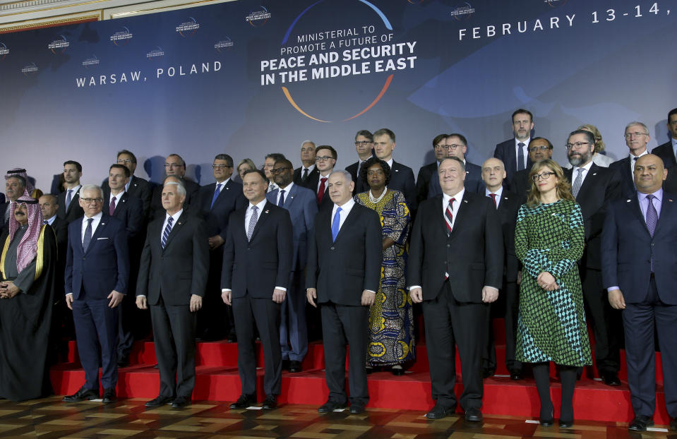 Front row third from left, United States Vice President Mike Pence, fourth from left, Poland's President Andrzej Duda, fifth from left, Israeli Prime Minister Benjamin Netanyahu and sixth from left, United States Secretary of State, Mike Pompeo, pose for a group photo at the Royal Castle in Warsaw, Poland, Wednesday, Feb. 13, 2019. The Polish capital is host for a two-day international conference on the Middle East, co-organized by Poland and the United States. (AP Photo/Michael Sohn)