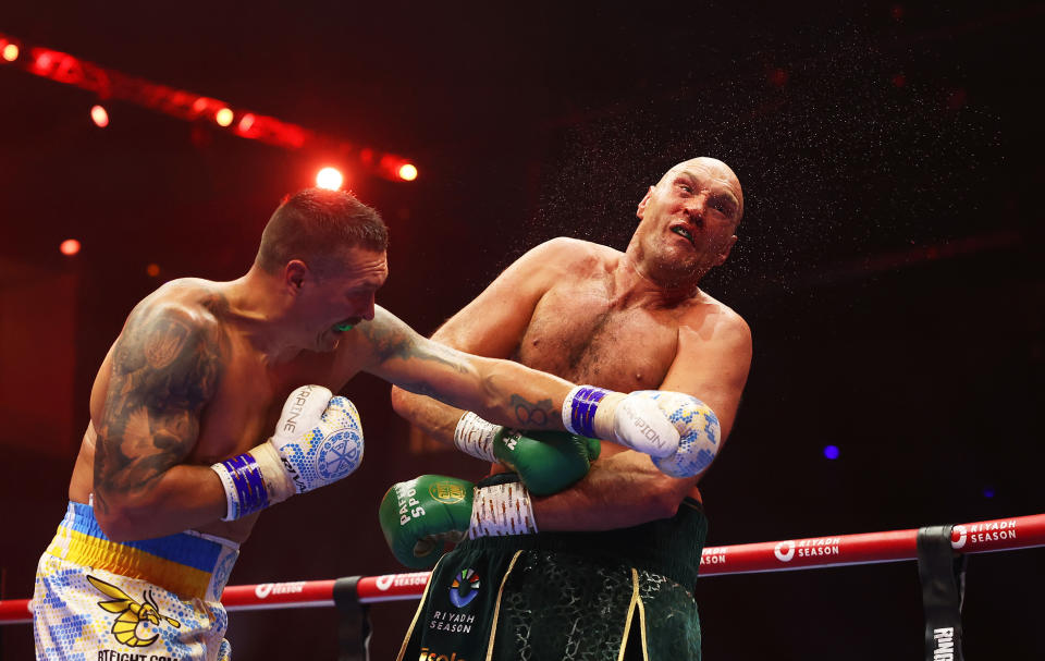 RIYADH, SAUDI ARABIA - MAY 18: Oleksandr Usyk punches Tyson Fury during the IBF, WBA, WBC, WBO and Undisputed Heavyweight titles' fight between Tyson Fury and Oleksandr Usyk at Kingdom Arena on May 18, 2024 in Riyadh, Saudi Arabia. (Photo by Richard Pelham/Getty Images)