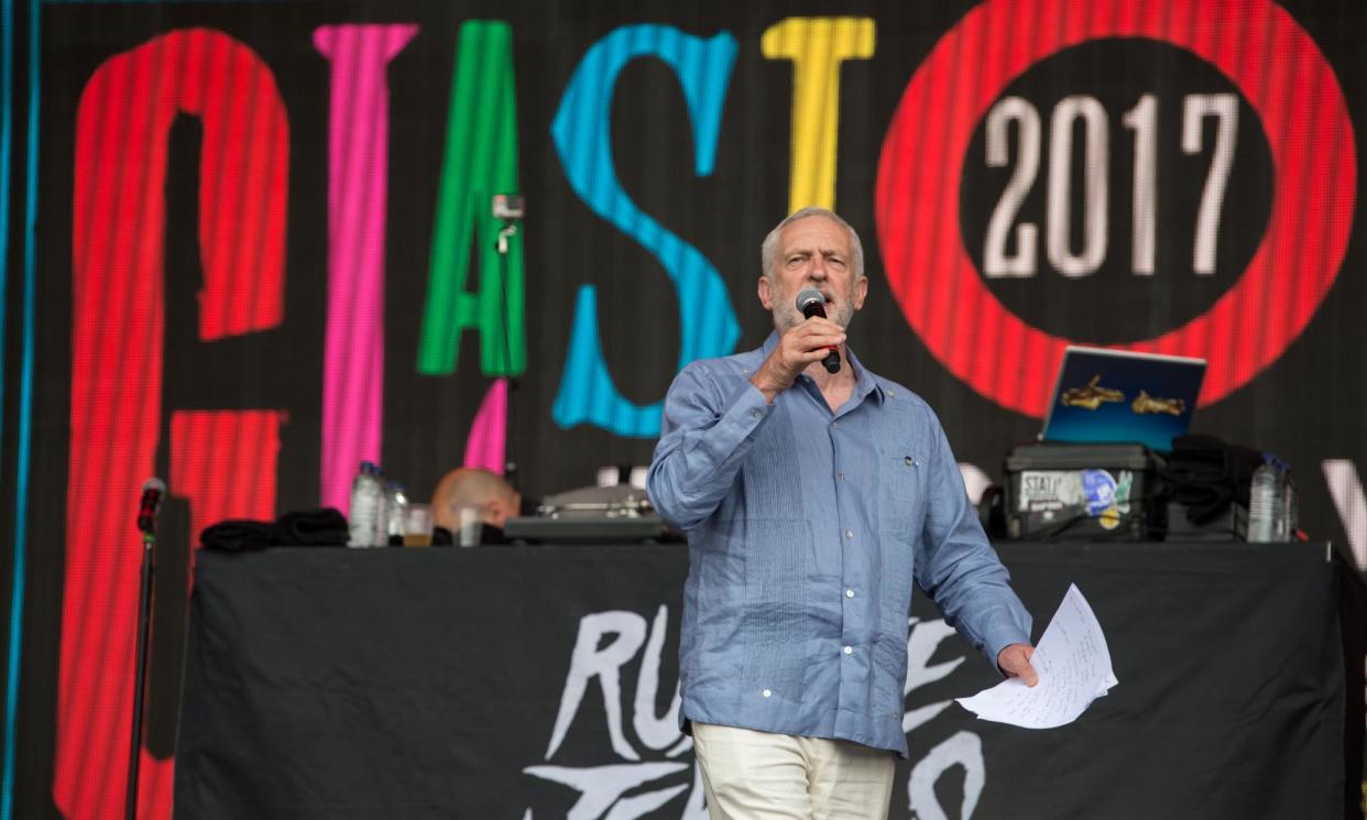 <span>Jeremy Corbyn, then Labour leader, on the Pyramid stage at Glastonbury in June 2017.</span><span>Photograph: Oli Scarff/AFP/Getty Images</span>