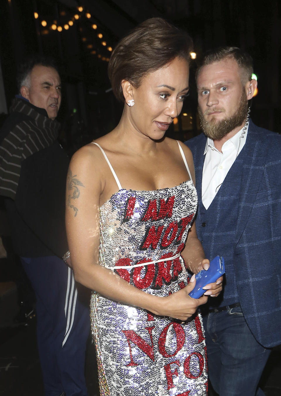 Photo by: KGC-49-182/STAR MAX/IPx 2018 11/27/18 Mel B seen leaving her new autobiography book launch "Brutally Honest" wearing a sequinned dress saying 'I Am Not Sorry I Am Not For Sale'.