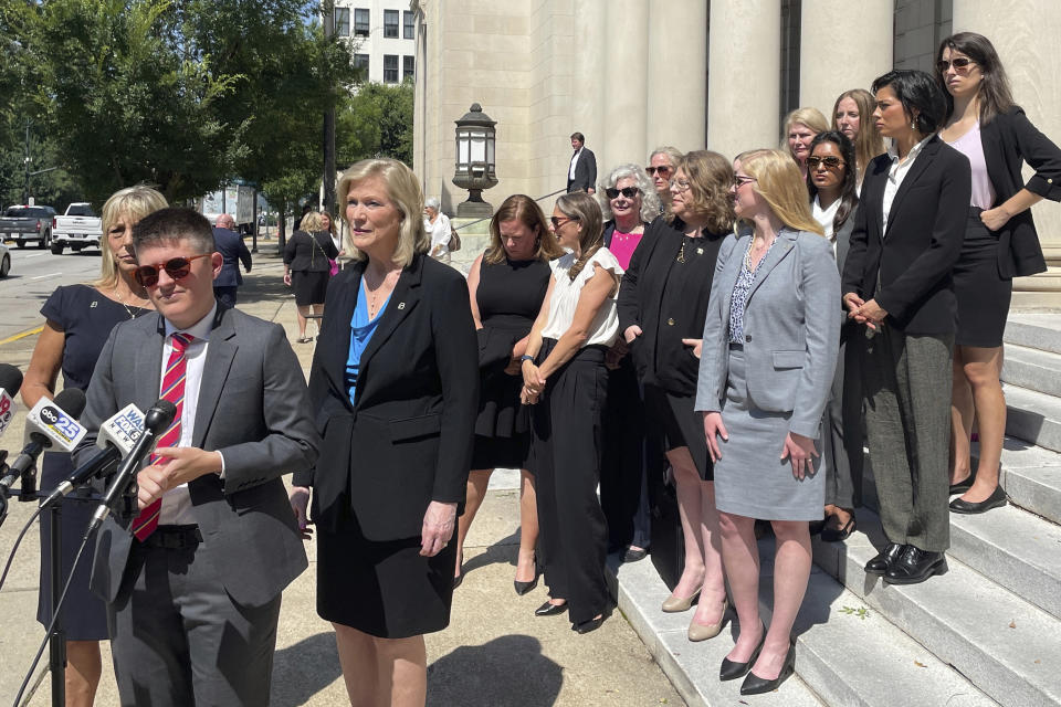 FILE - The legal team for Planned Parenthood South Atlantic speaks outside the South Carolina Supreme Court building in Columbia, S.C. on Tuesday, June 27, 2023. South Carolina’s new all-male Supreme Court reversed course on abortion on Wednesday, Aug. 23, 2023, upholding a ban on most such procedures after about six weeks of pregnancy. (AP Photo/James Pollard, File)