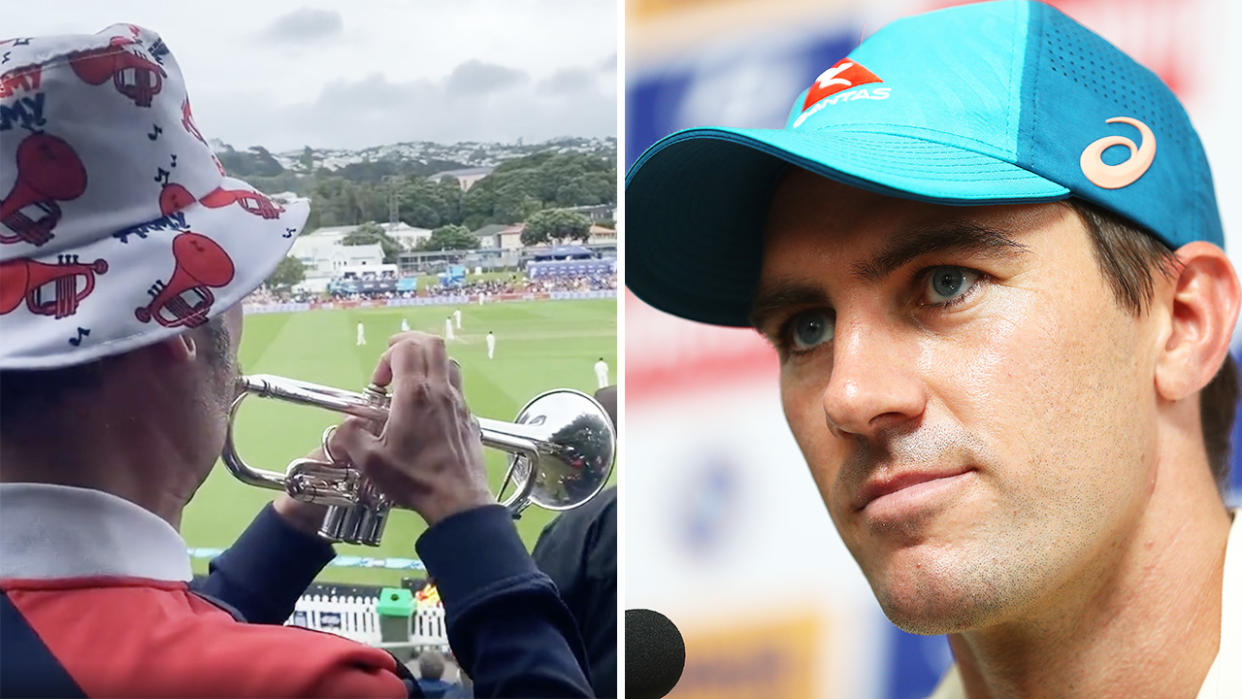 The Barmy Army's trumpeter is pictured left, with Australian captain Pat Cummins on the right.