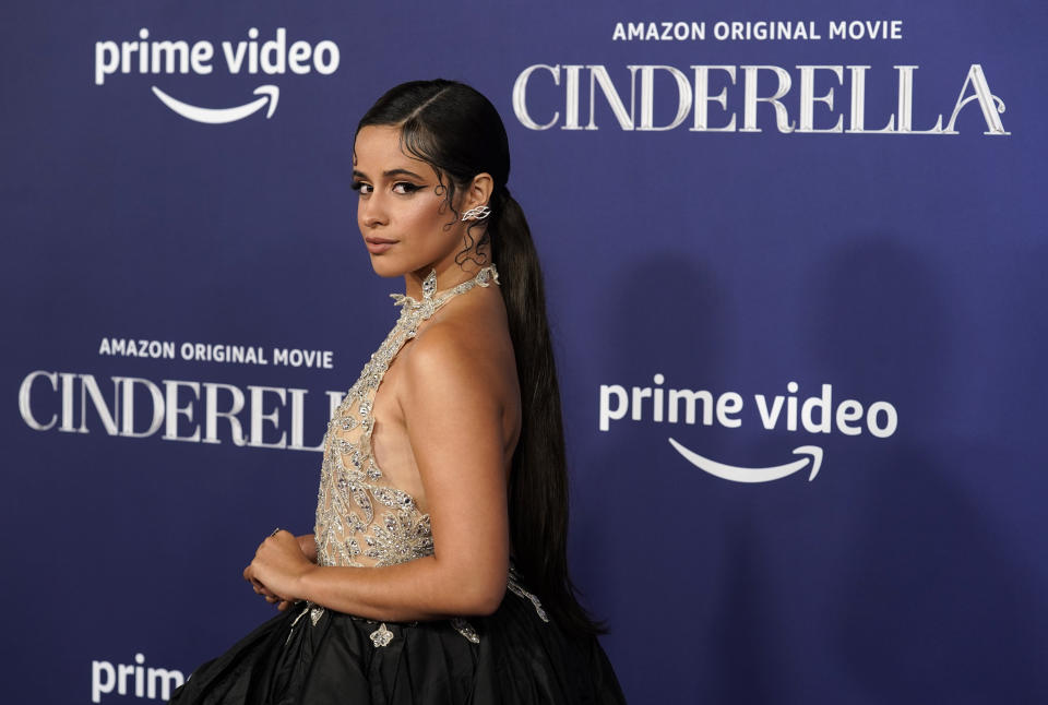 FILE - Camila Cabello, a cast member in "Cinderella," turns back for photographers at the premiere of the film, Monday, Aug. 30, 2021, at the Greek Theatre in Los Angeles. Cabello turns 25 on March 3. (AP Photo/Chris Pizzello, File)