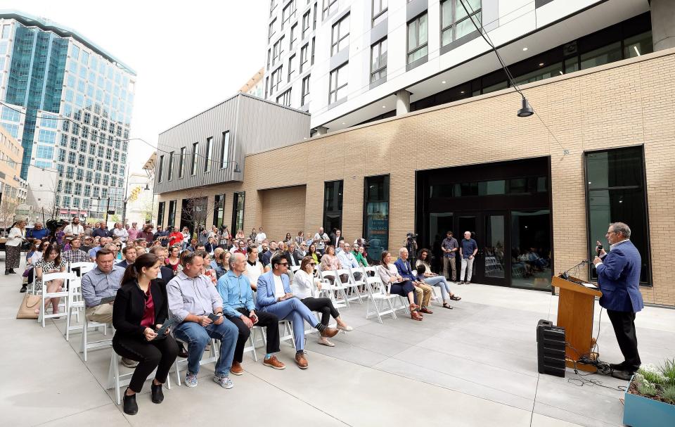 David Brint, with Brinshore Development, speaks at a ribbon-cutting ceremony for The Aster, a three-building development that includes low-income housing, commercial and public spaces, in Salt Lake City on Tuesday, May 2, 2023. | Kristin Murphy, Deseret News
